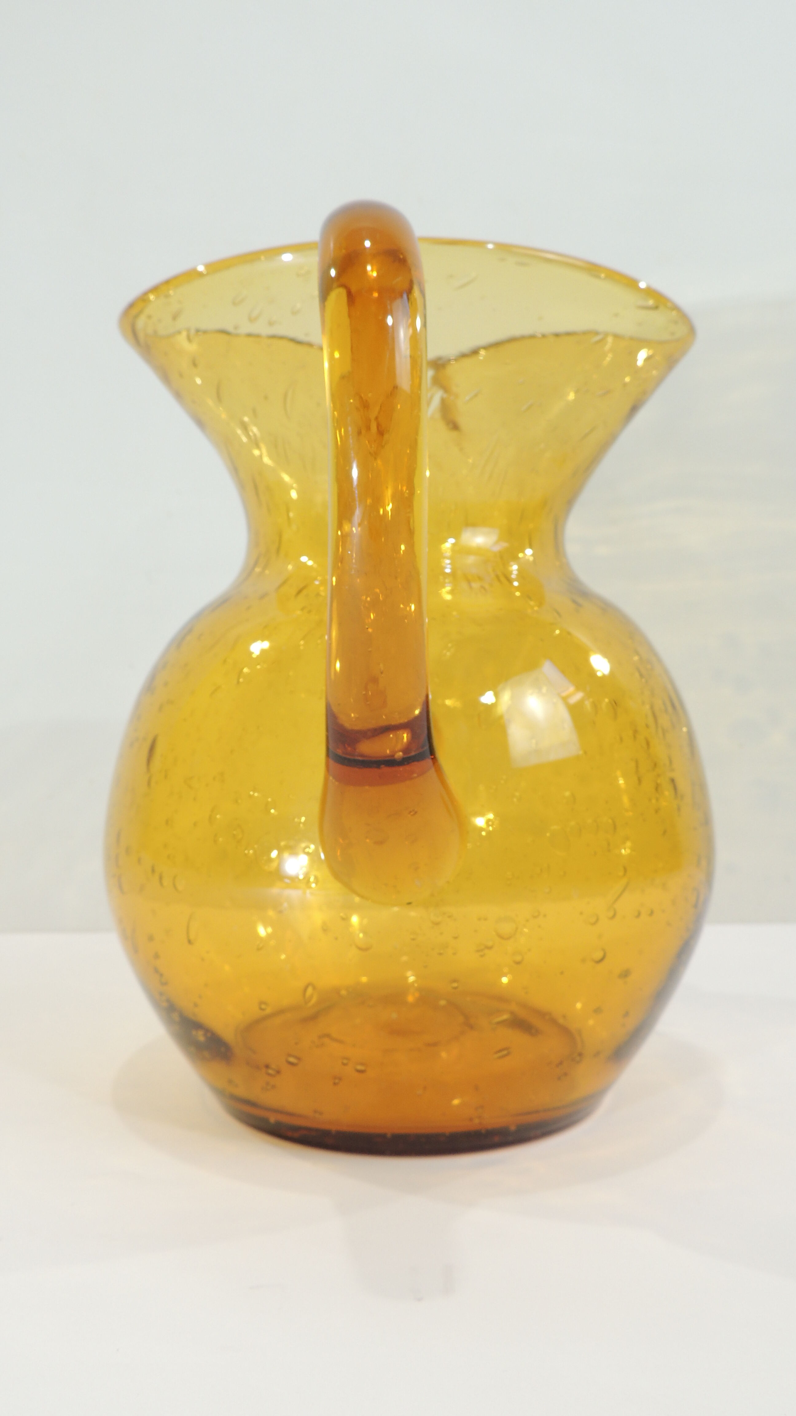 Bubbled glass pitcher biot style from the glassworks La Rochere