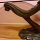 Coffee table, young woman in resin, smoked and beveled glass