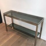 Beautiful console table in brushed metal with bluish glass shelves