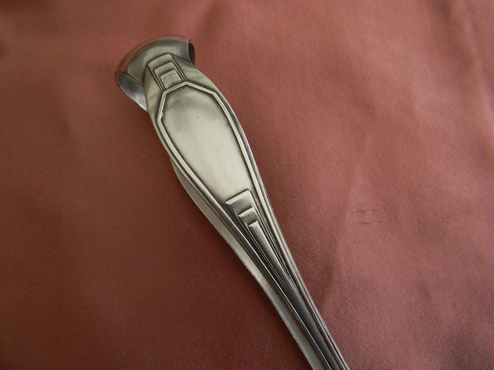 Art deco sugar tongs in silver metal