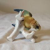 Polychrome porcelain parakeet figurine by Karl Ens.