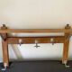Wall-mounted coat rack with vintage hooks