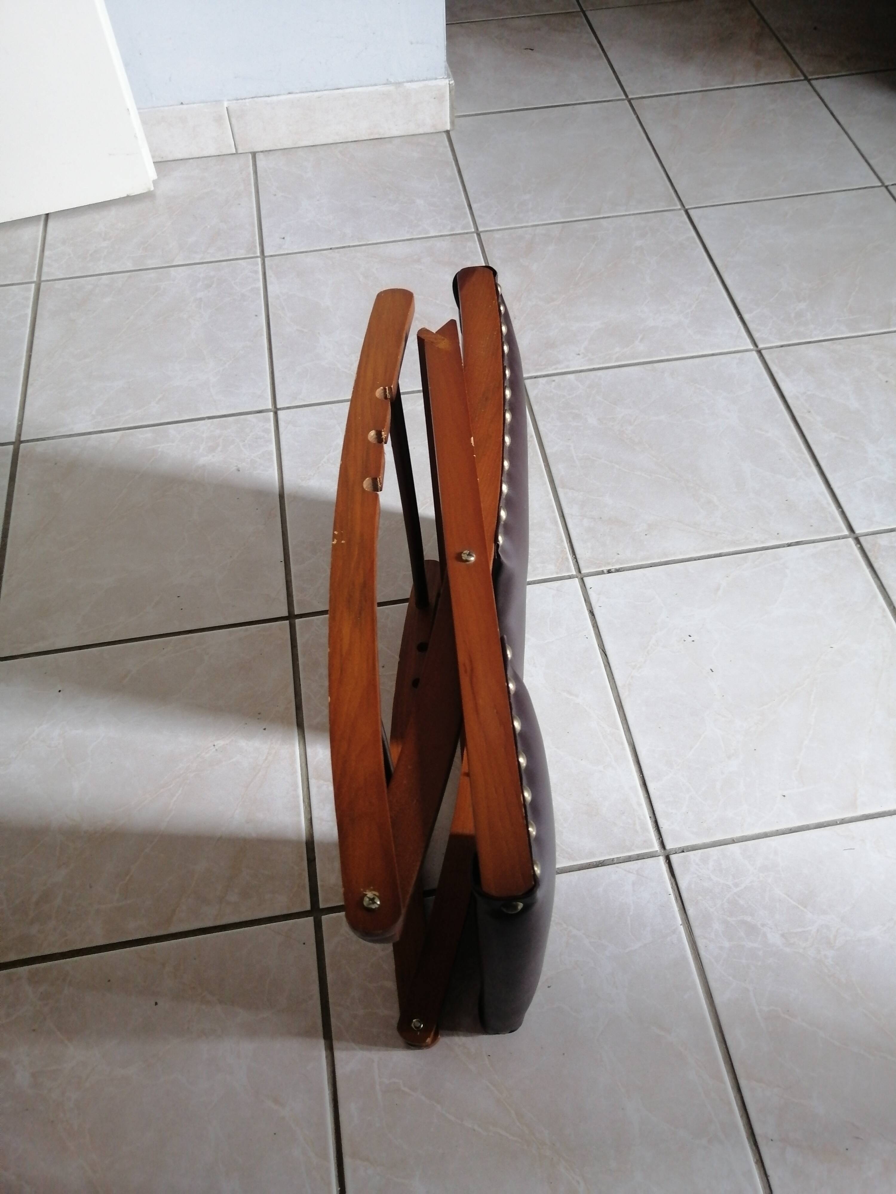 Vintage rocking footrests in wood and faux leather