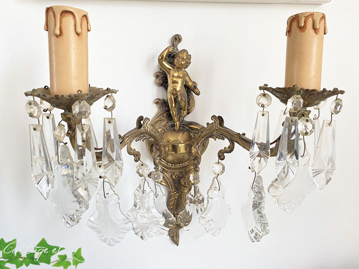 Two bronze spokes with tassels