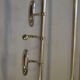 Chrome iron coat holder with a hat holder