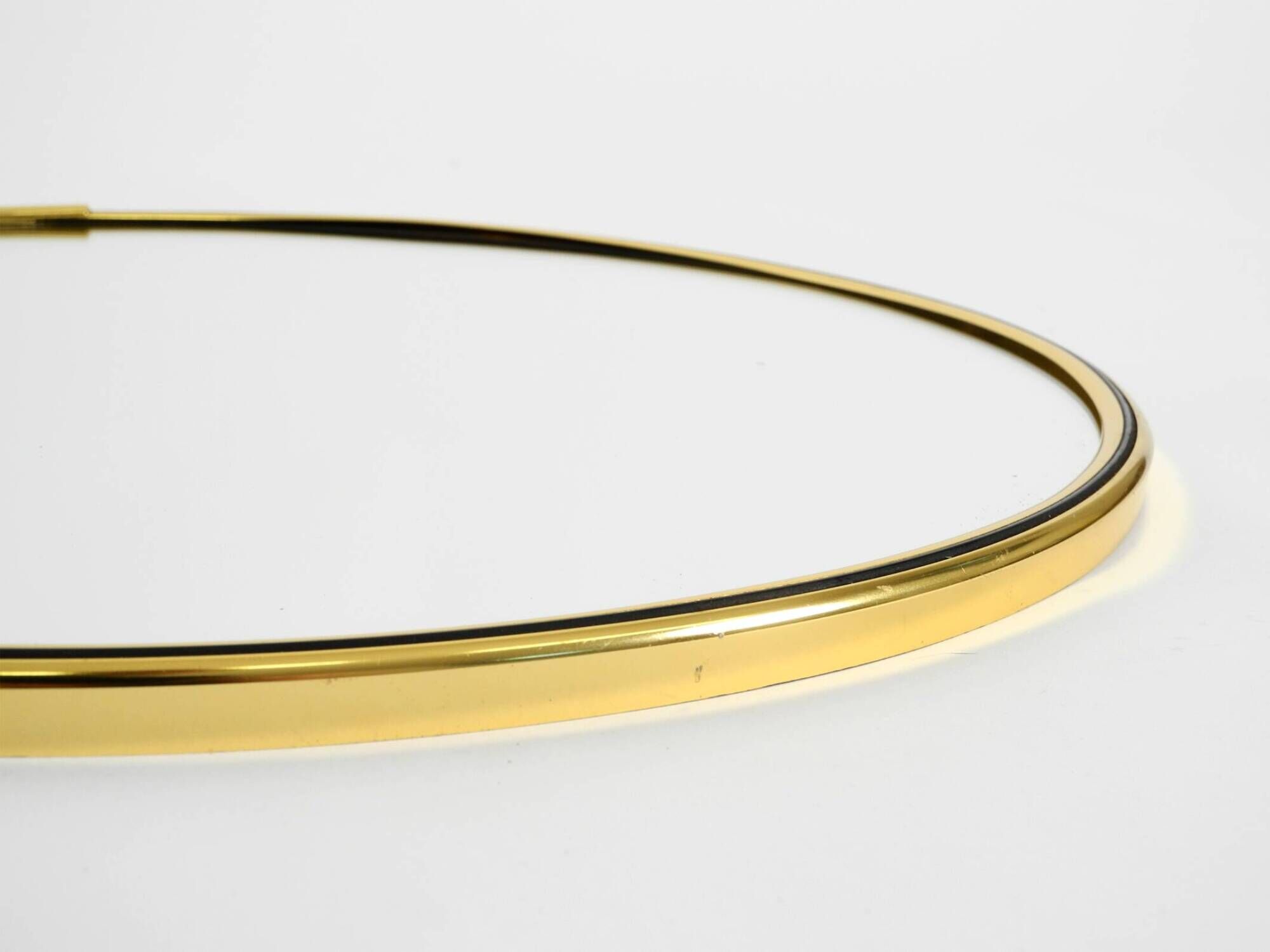 Beautiful, heavy Mid-Century Modern brass wall mirror by Lenz, 1964