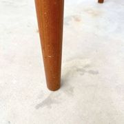 Teak dining table with integrated extensions — Scandinavian
