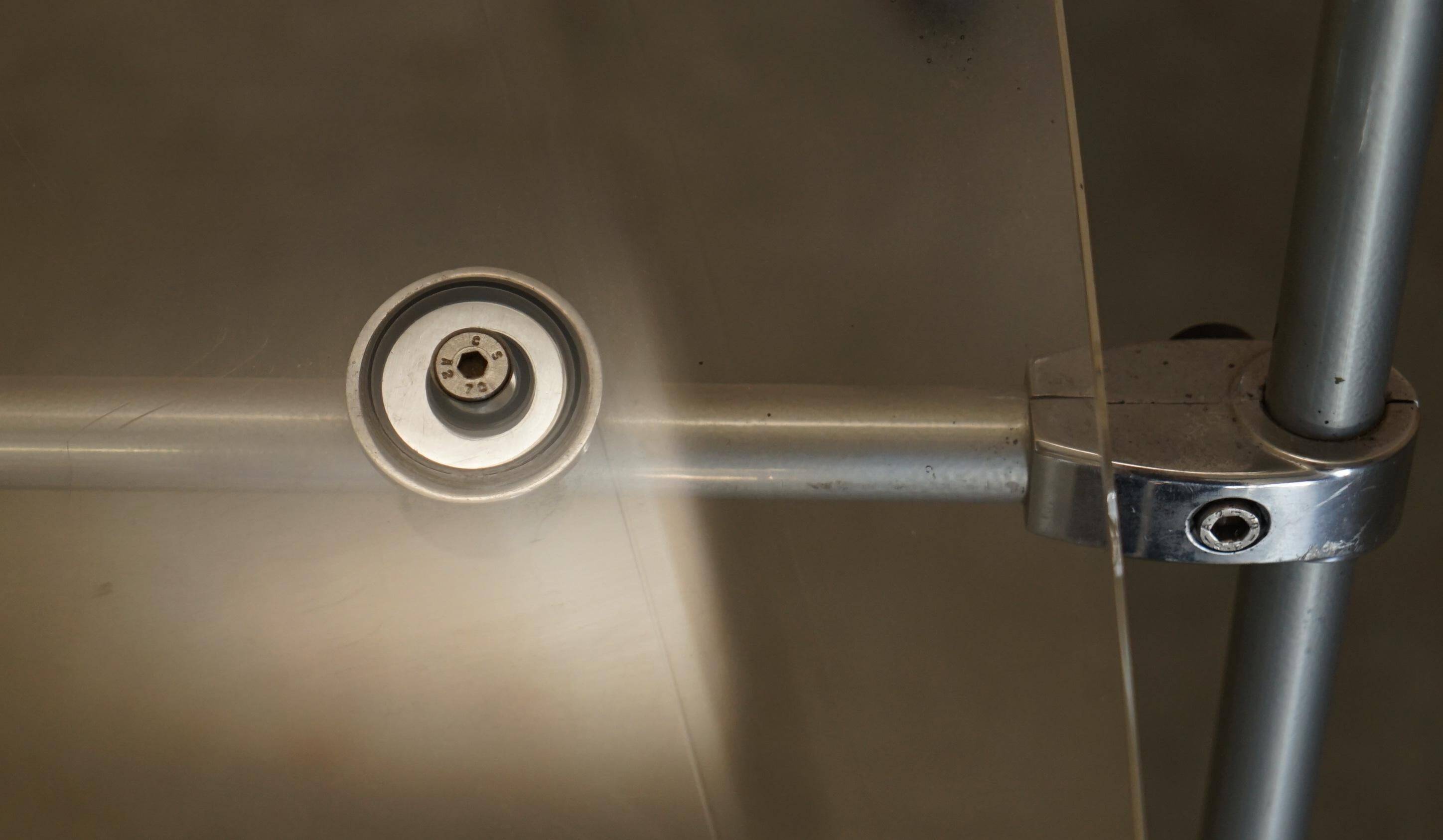 Metal and lucite folding chair, swivel backrest.