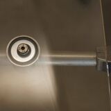 Metal and lucite folding chair, swivel backrest.