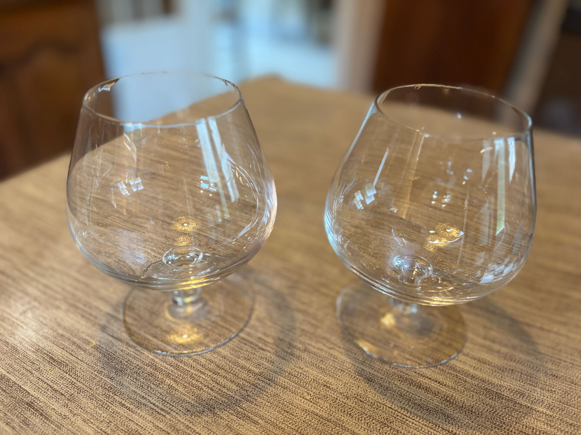 Set of two antique brandy glasses.
