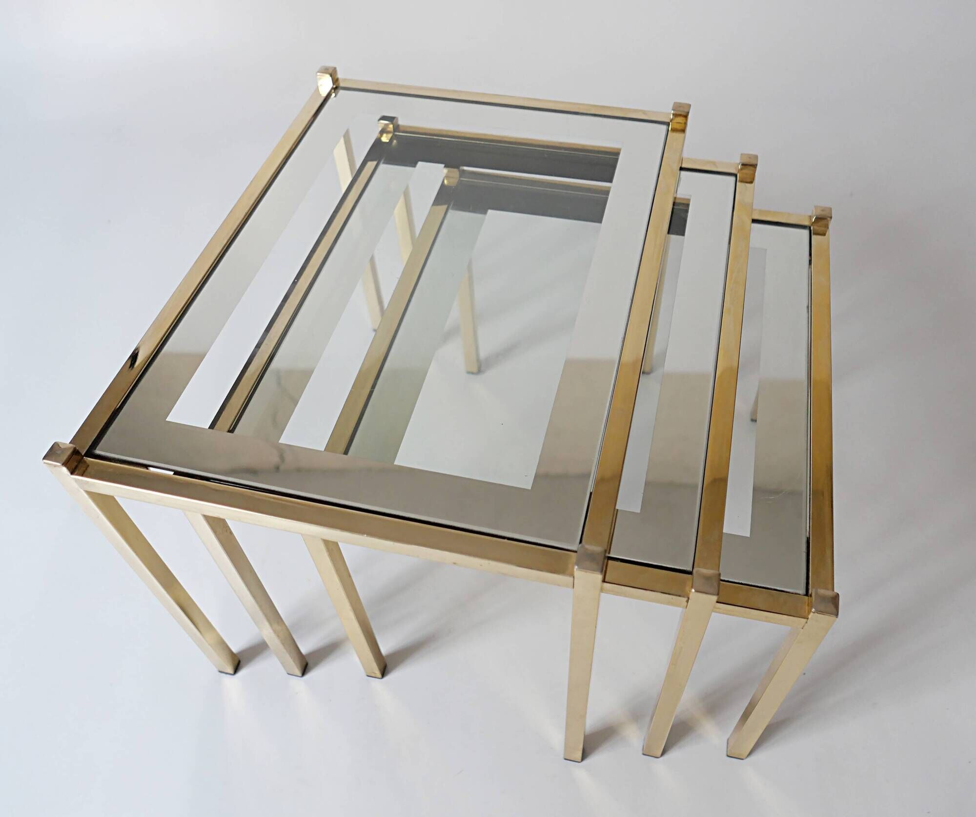 nesting tables in gold metal and mirror vintage 1970s design