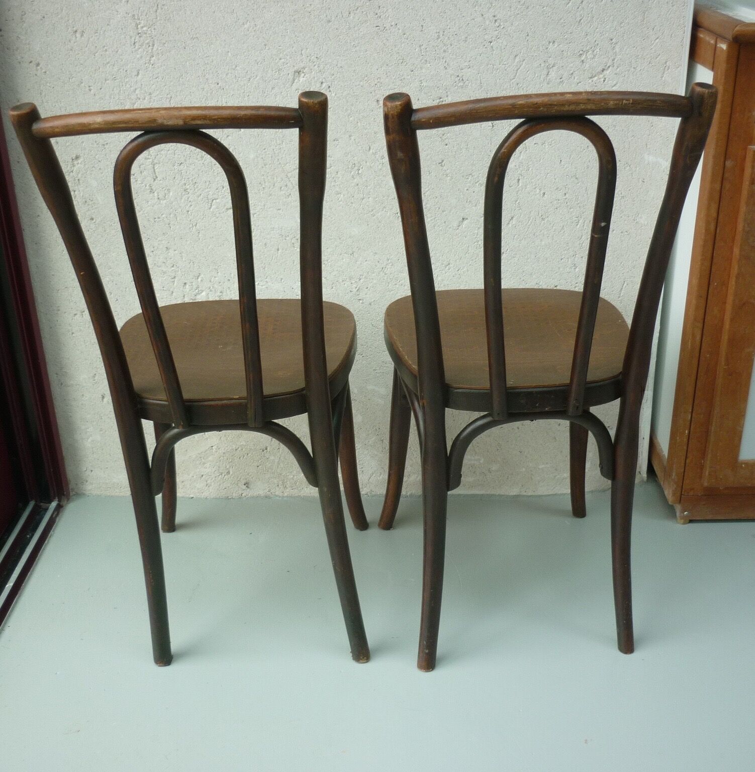 Pair of antique curved wood bistro chairs