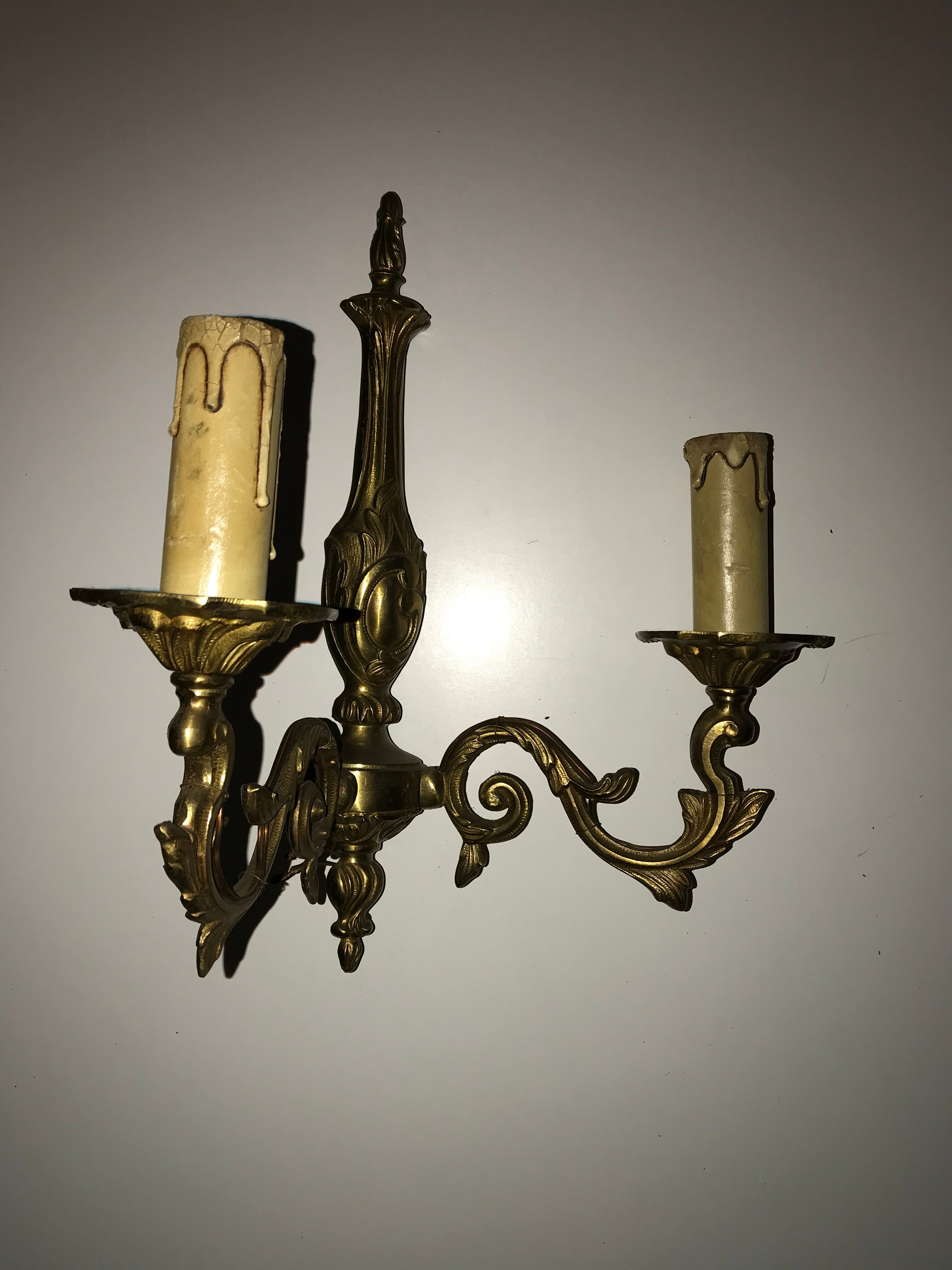 Pair of Louis XV style bronze wall sconces