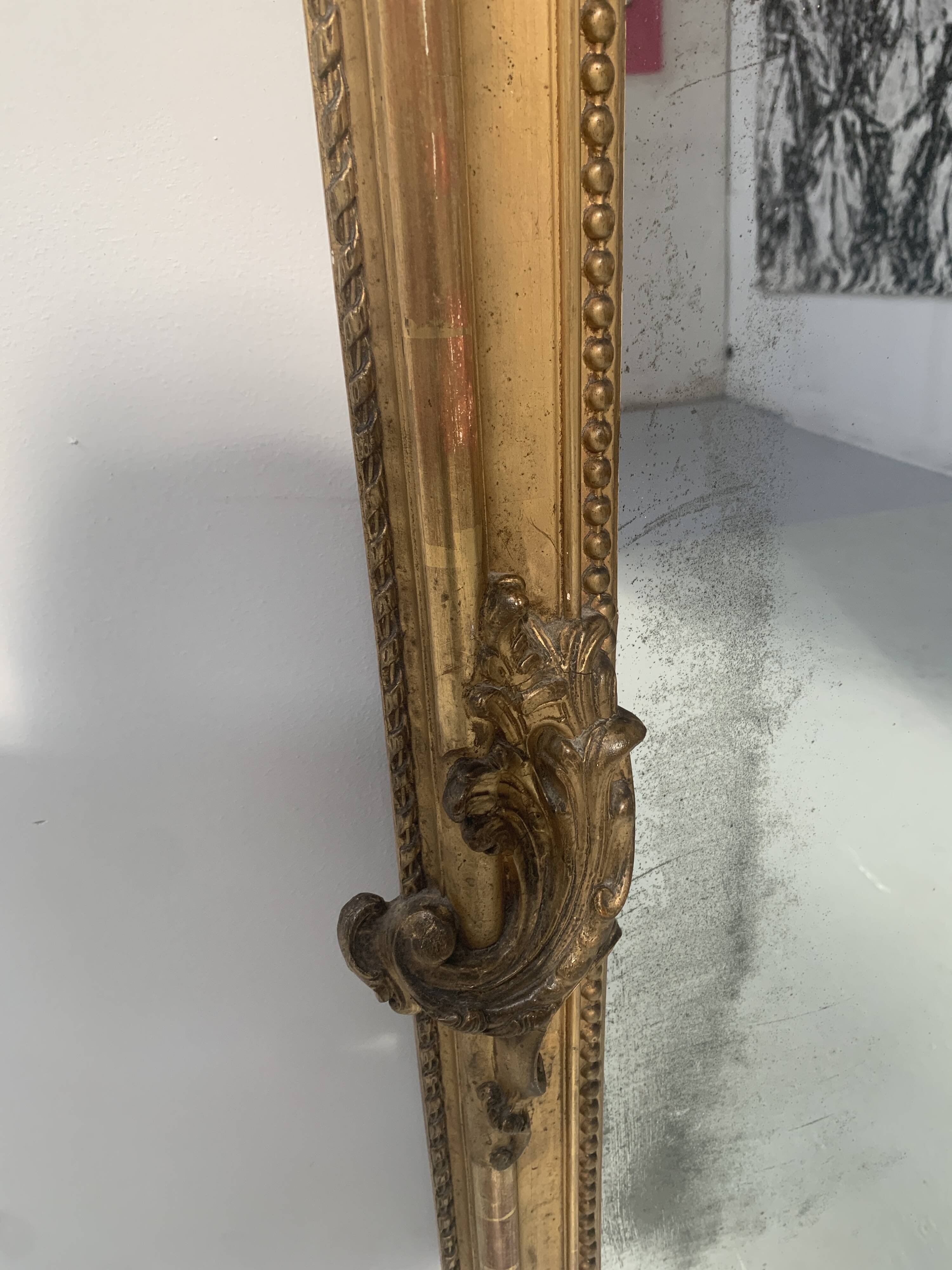 Louis XV style mirror in wood and gilded stucco, 19th century