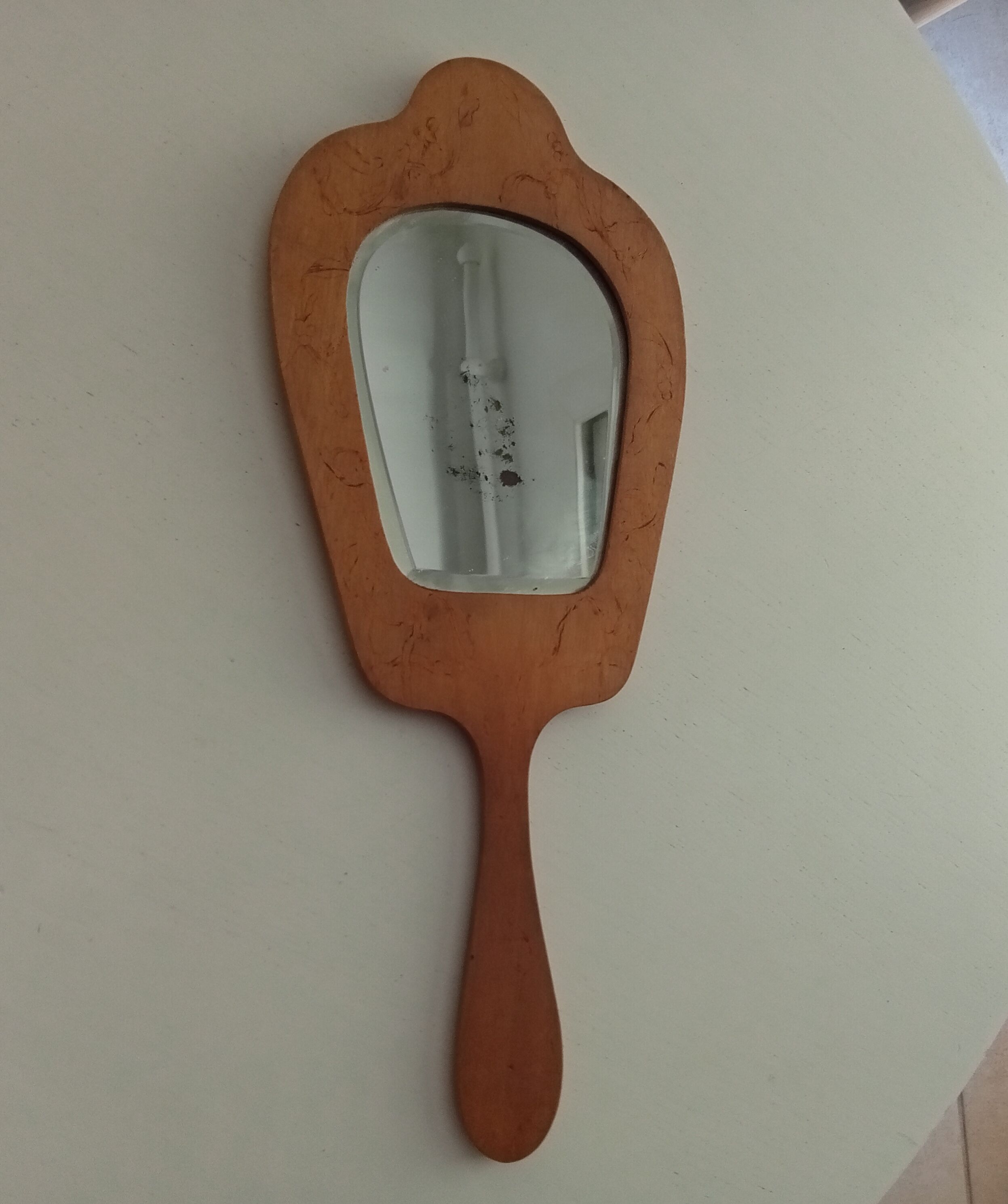 Antique beveled hand mirror