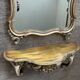 Ancien miroir et console murale en bois sculpté