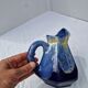 Old flamed ceramic jug. Very beautiful shades of blue, 6 sides.