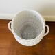 White wicker laundry basket