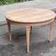 Round extendable dining table stripped in cherry wood Louis XVI René Trotel 1