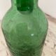 Old cracked glass carafe