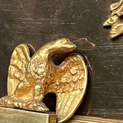 Empire-style fireplace decoration.