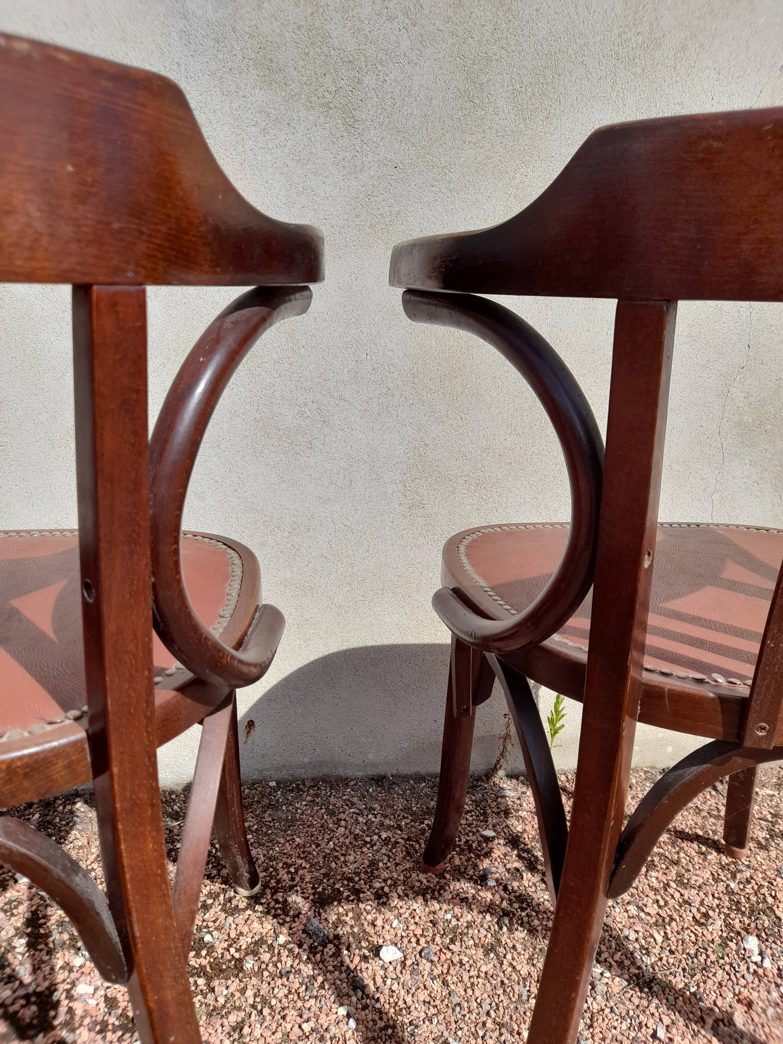 Pair of bistro armchairs signed Baumann 1930
