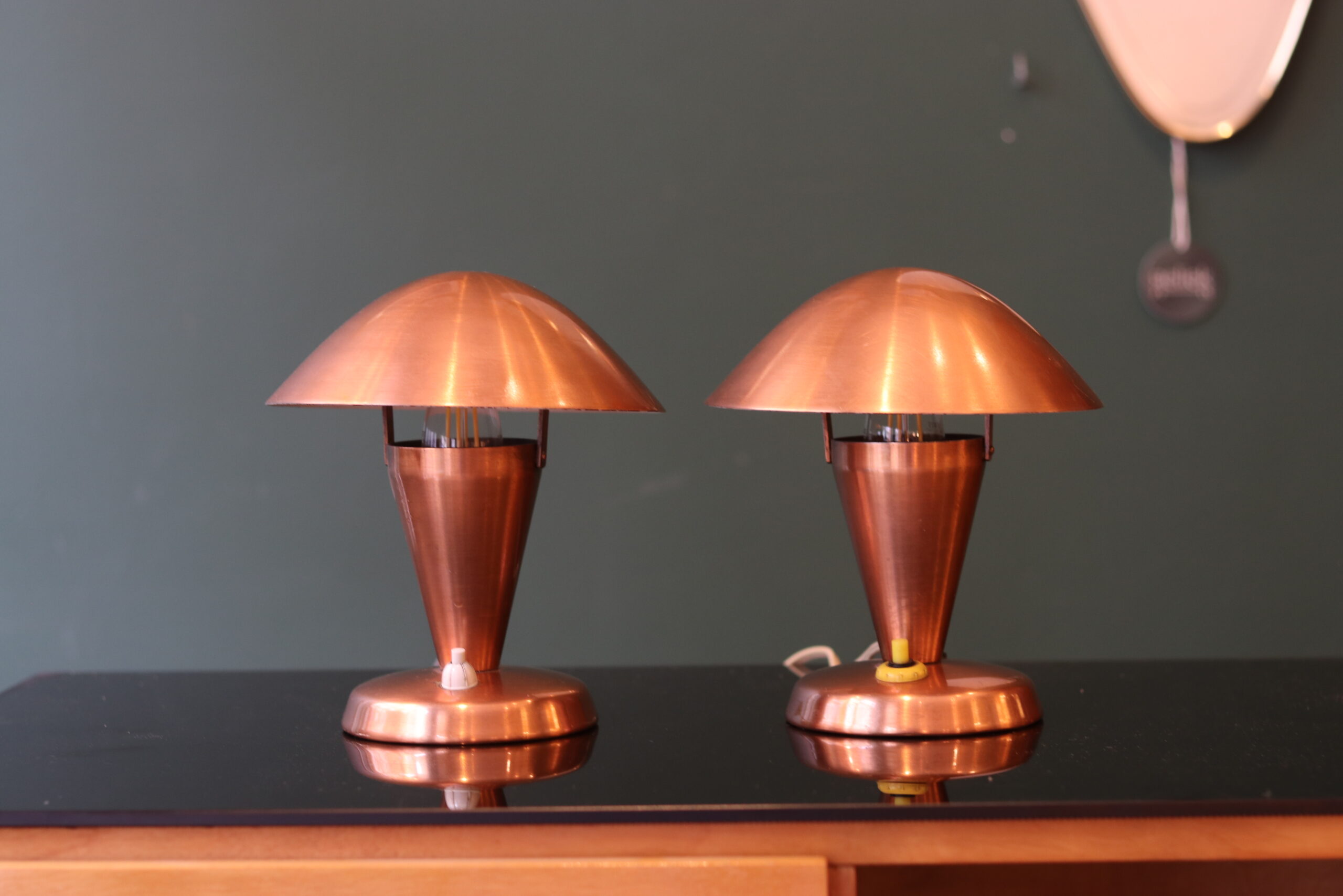 Pair of Bauhaus style mushroom lamps in copper metal.