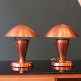 Pair of Bauhaus style mushroom lamps in copper metal.