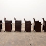 Tito Agnoli for Matteo Grassi leather dining table and six chairs