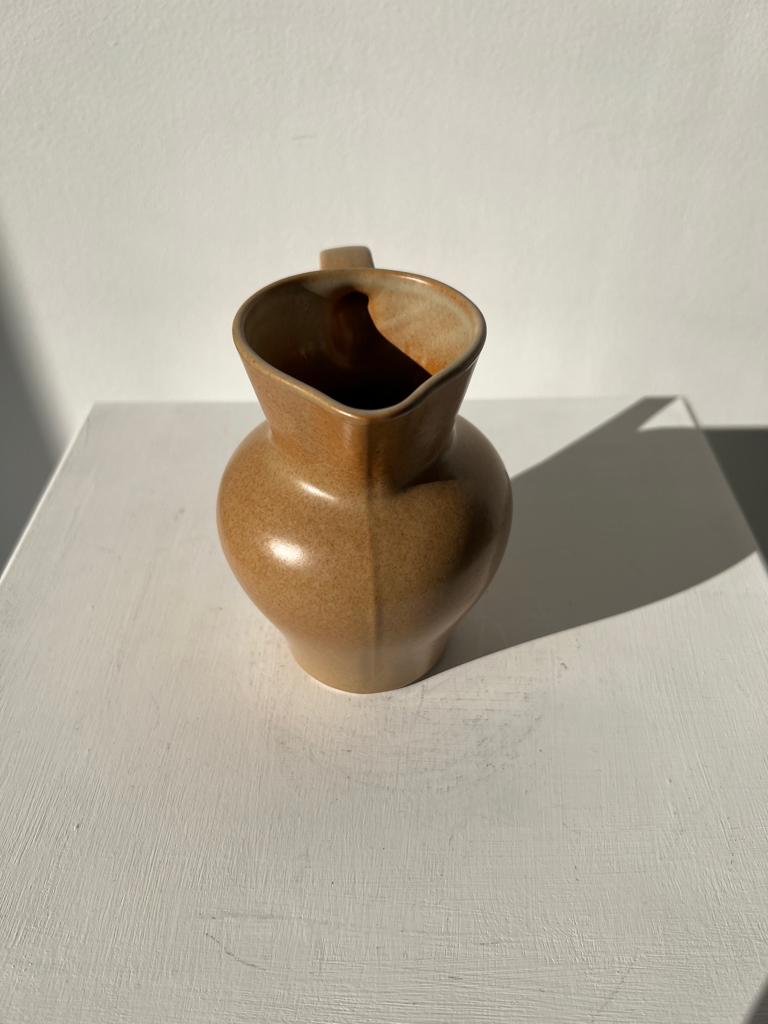 Pitcher in light beige sandstone