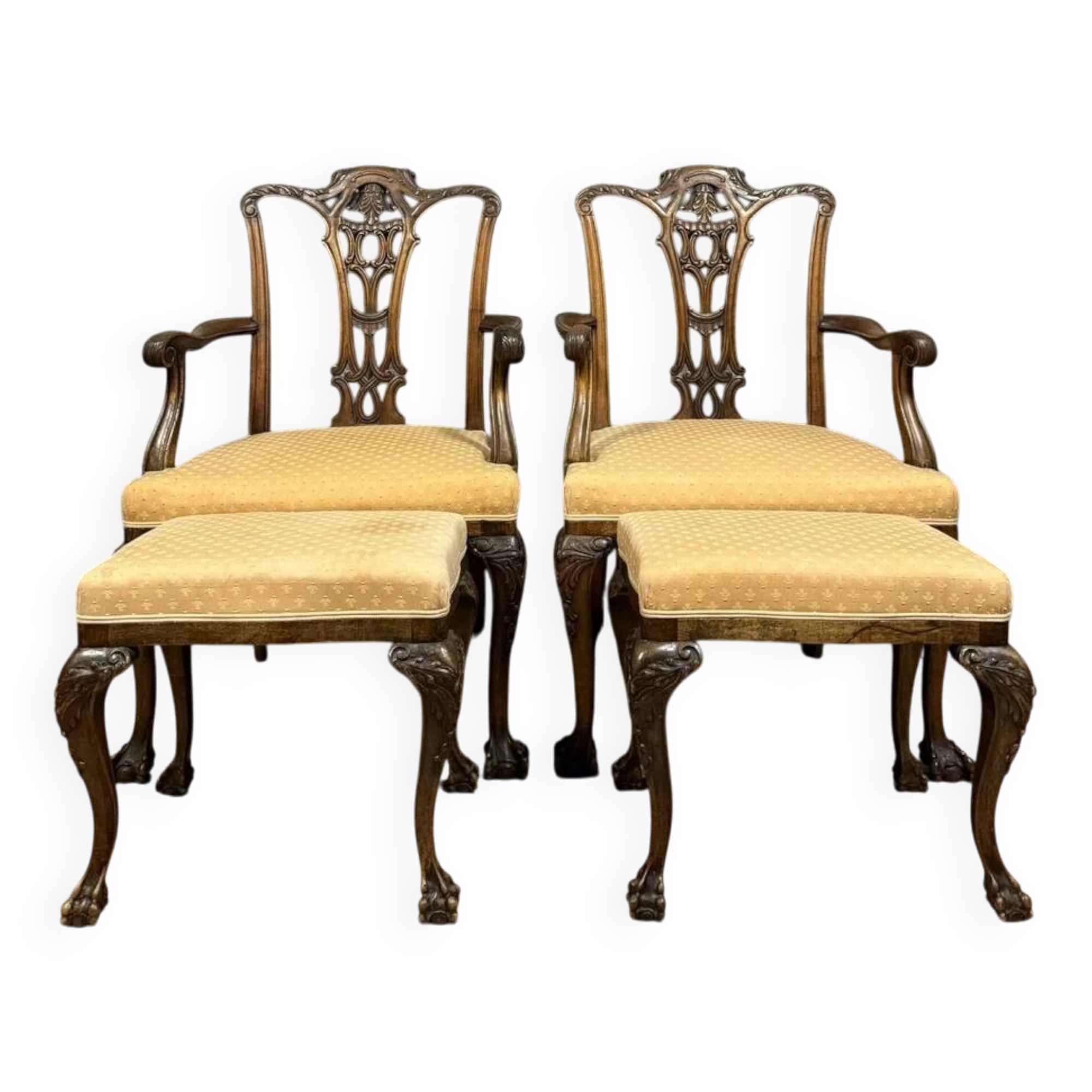 Pair of English armchairs with mahogany footrests circa 1850