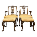 Pair of English armchairs with mahogany footrests circa 1850