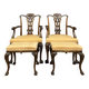 Pair of English armchairs with mahogany footrests circa 1850
