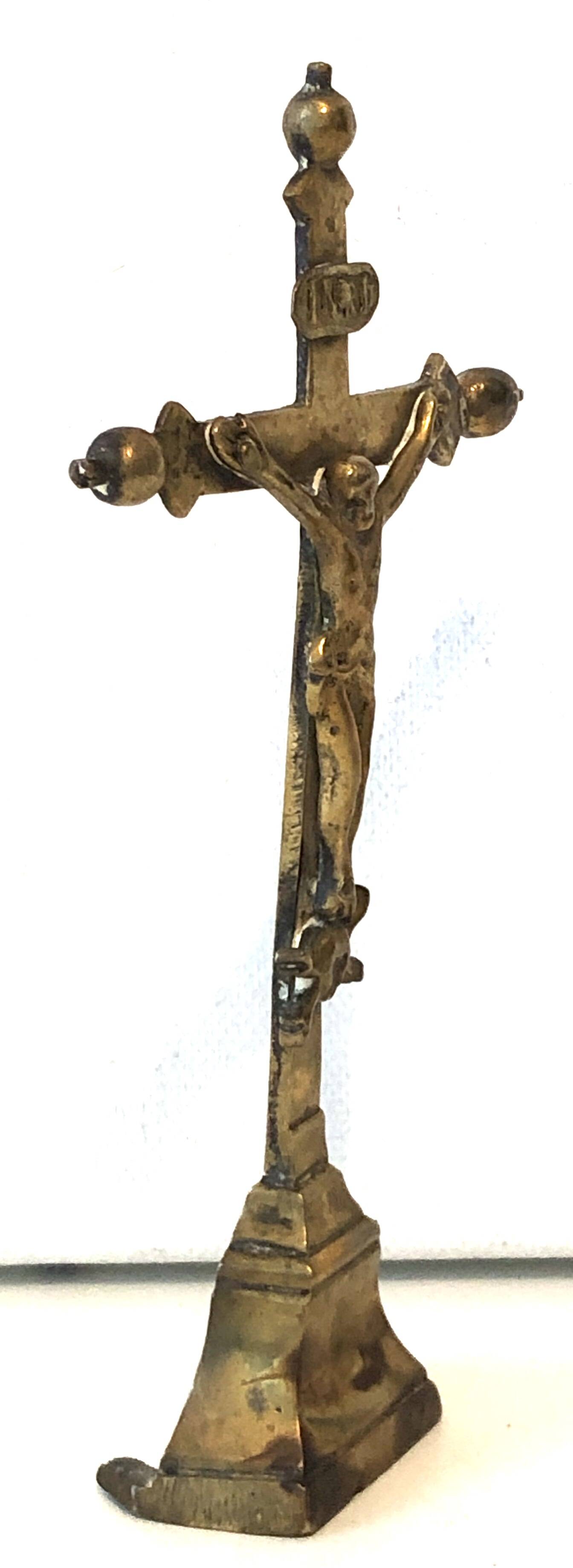 Old golden brass crucifix