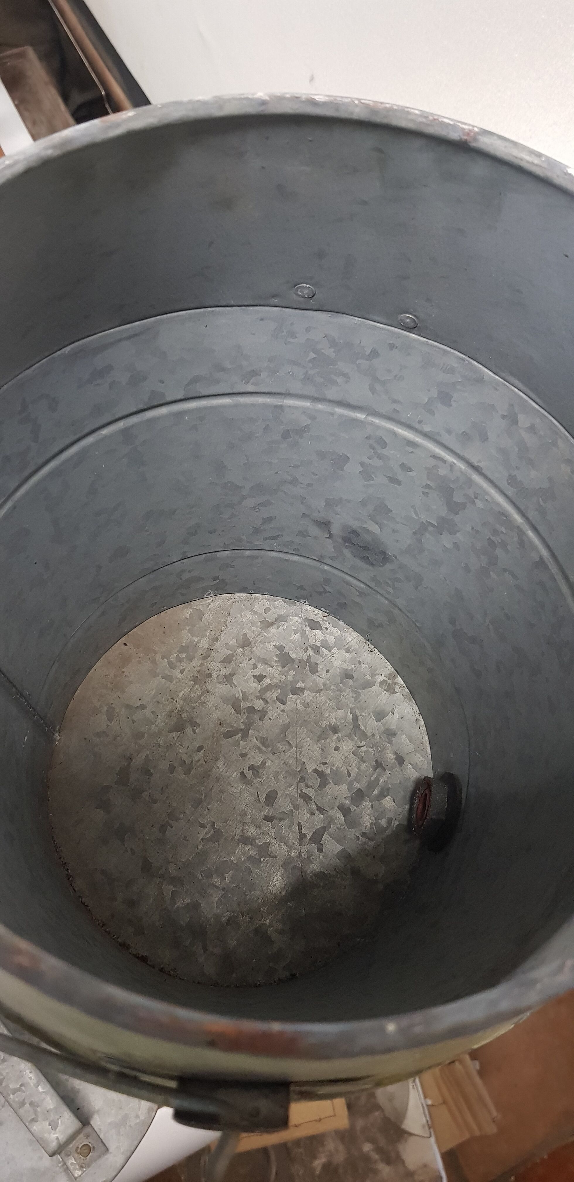 Zinc basin with a faucet