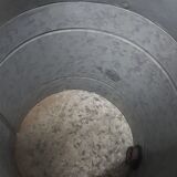 Zinc basin with a faucet