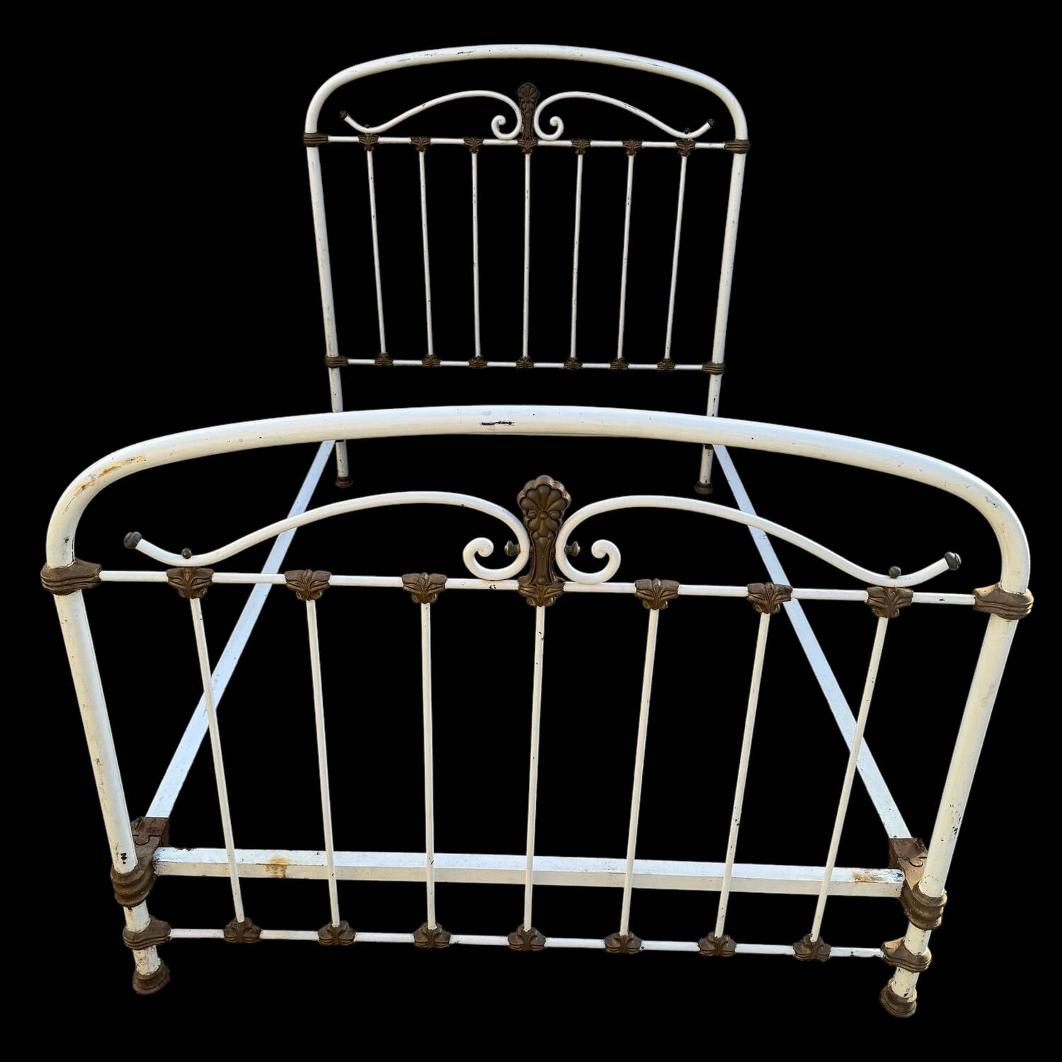 Antique wrought iron bed from the 1900s