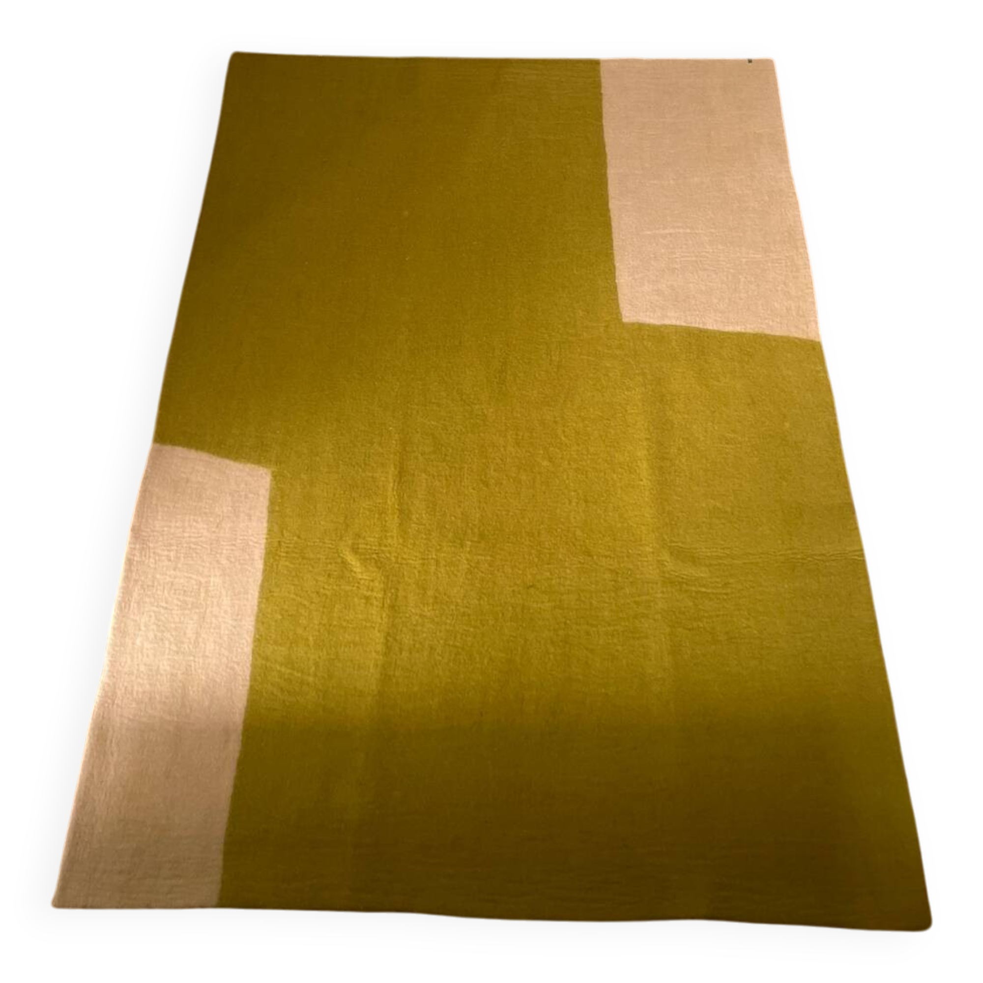 Large felted wool rug from the brand Muskhane, handmade.