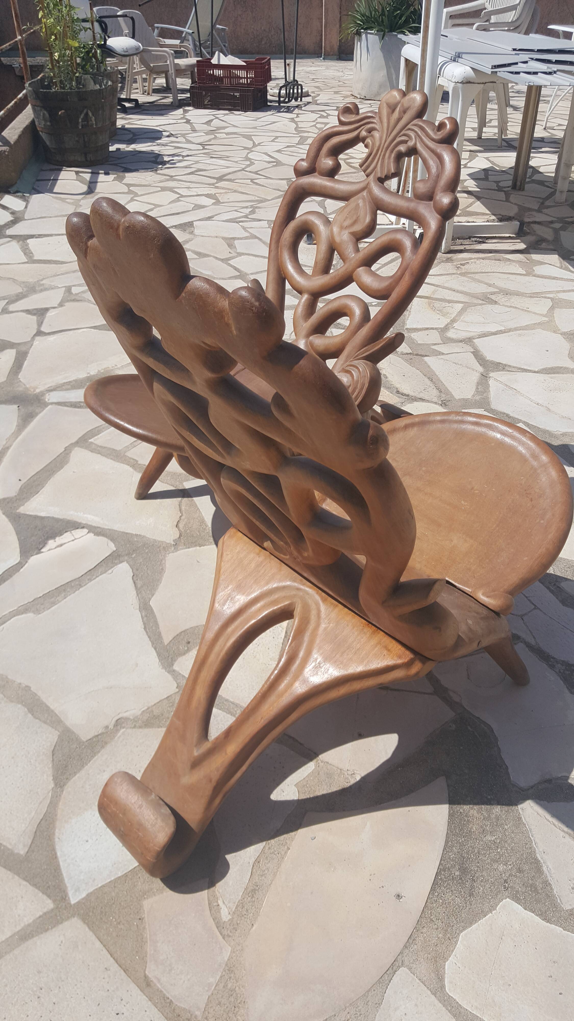 Pair of solid mahogany armchairs from Madagascar, circa 1950