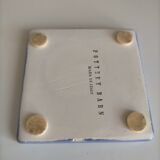 A set of two undersides of flat
