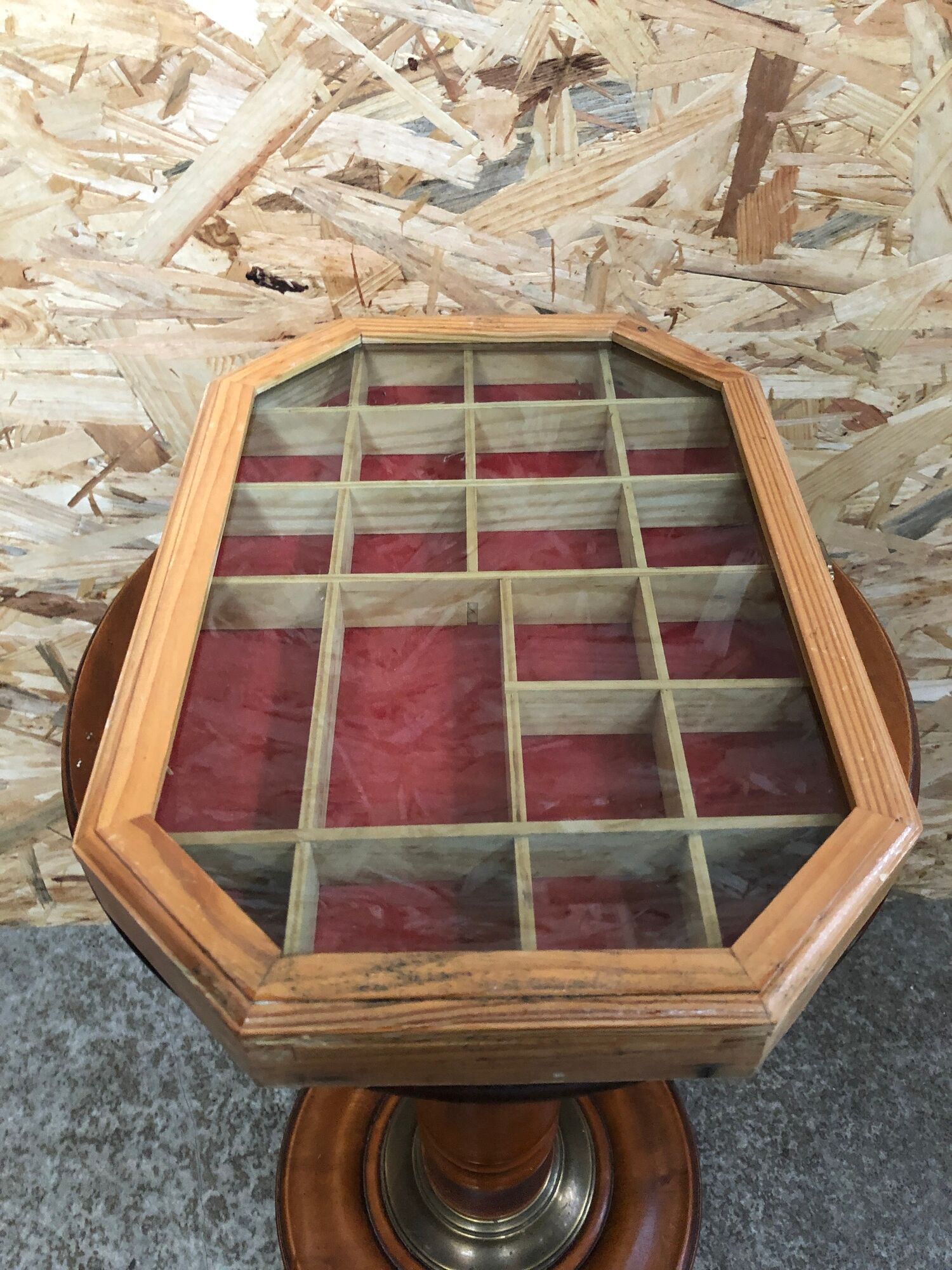 Old hanging showcase 22 wooden boxes red background