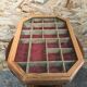Old hanging showcase 22 wooden boxes red background