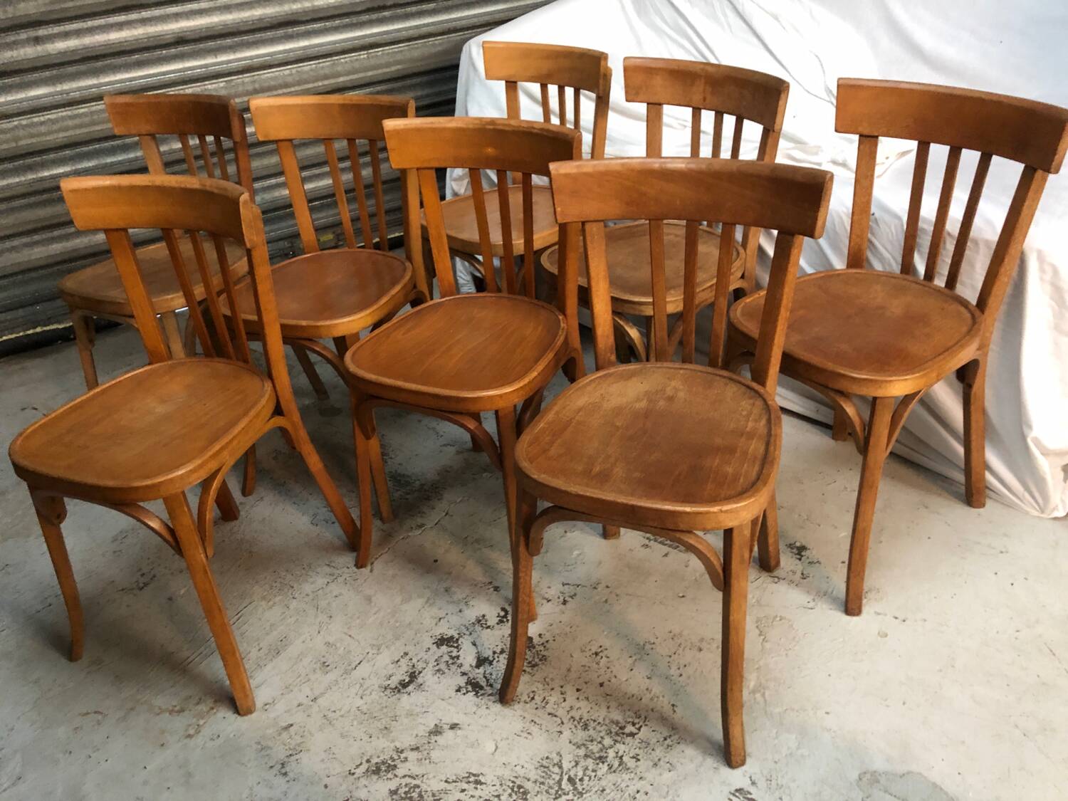 8 antique Baumann bistro chairs