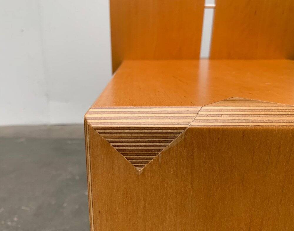 Postmodern chair with a high backrest