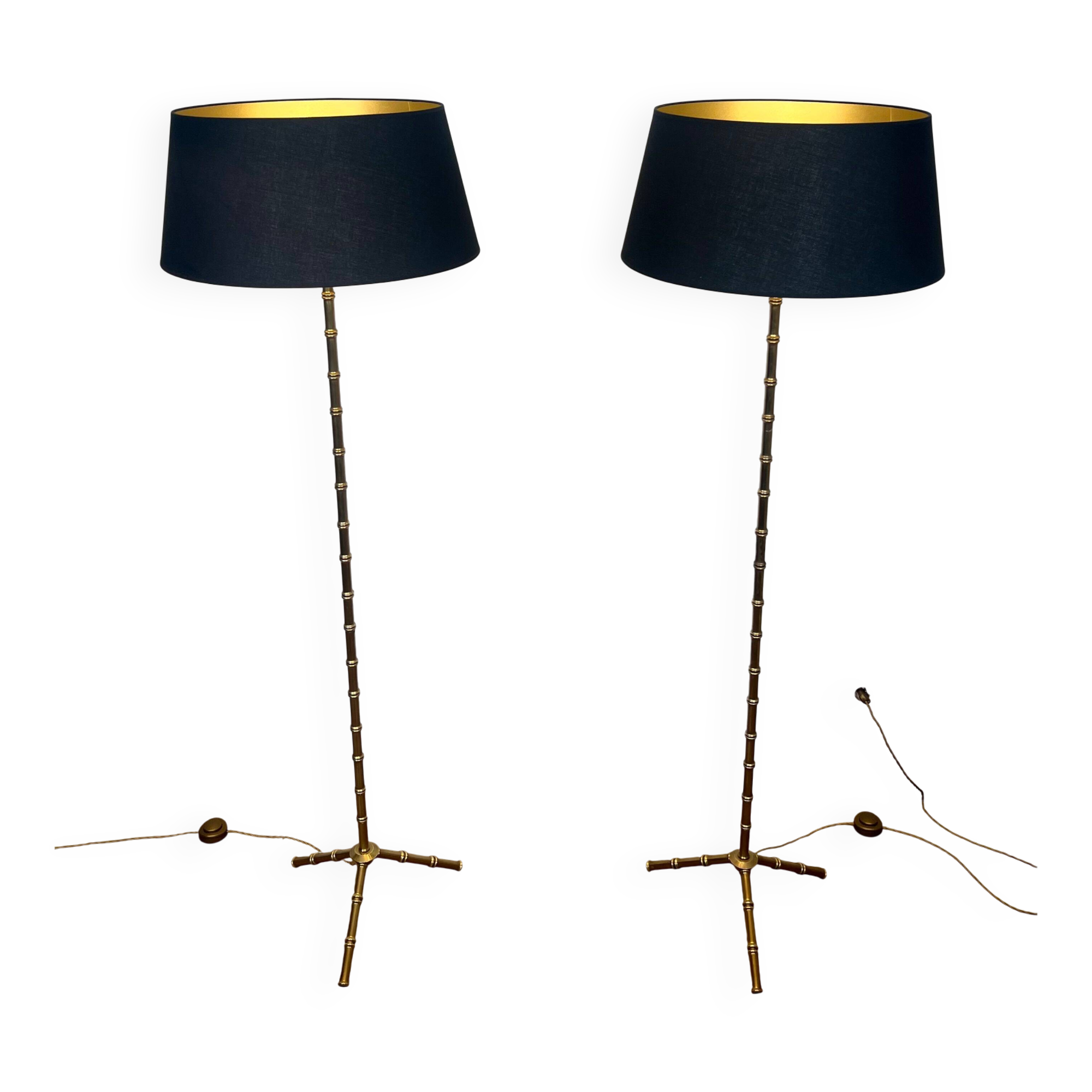 Pair of parquet floor lamps in faux-bamboo style in bronze and brass by Jacques Adnet.