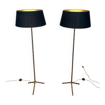 Pair of parquet floor lamps in faux-bamboo style in bronze and brass by Jacques Adnet.