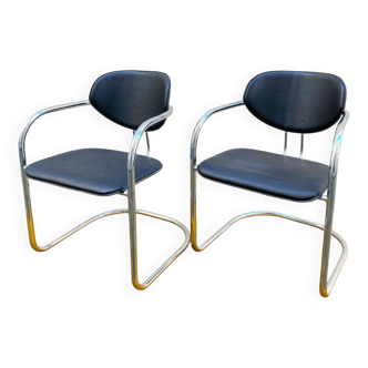 Effezeta chairs, tubular structure in chrome and black skai