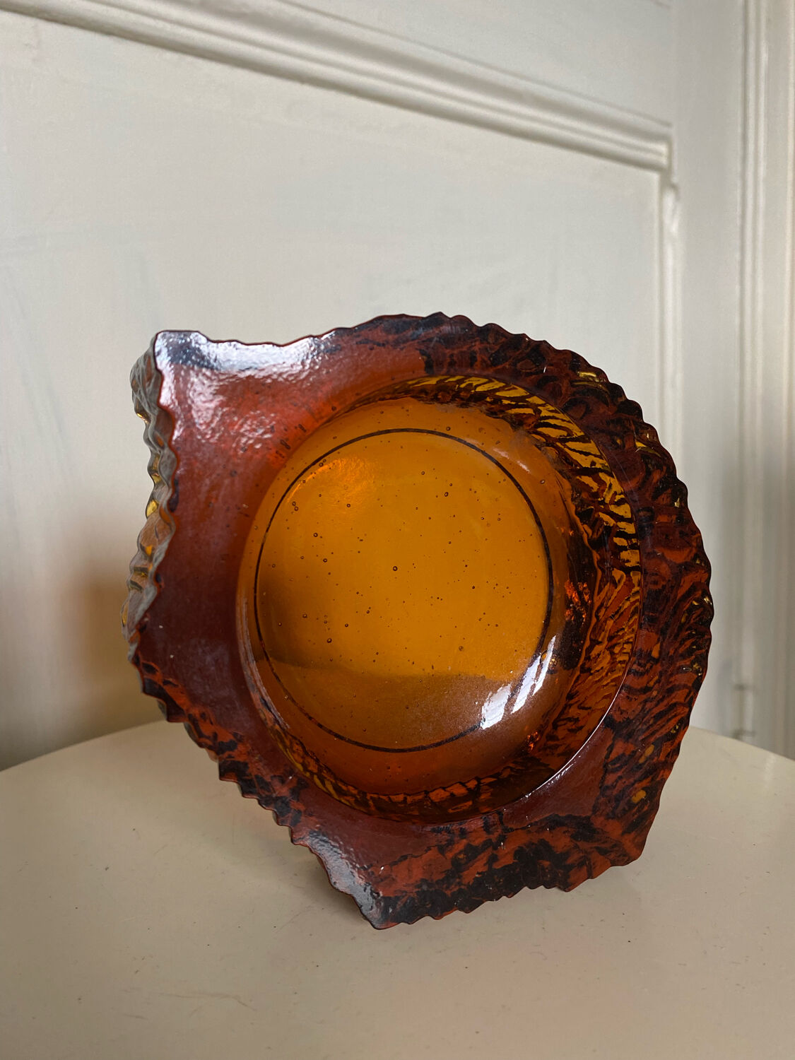 Ashtray in amber bubbled glass