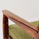Fauteuil rétro en tissu boucle vert, forme ergonomique