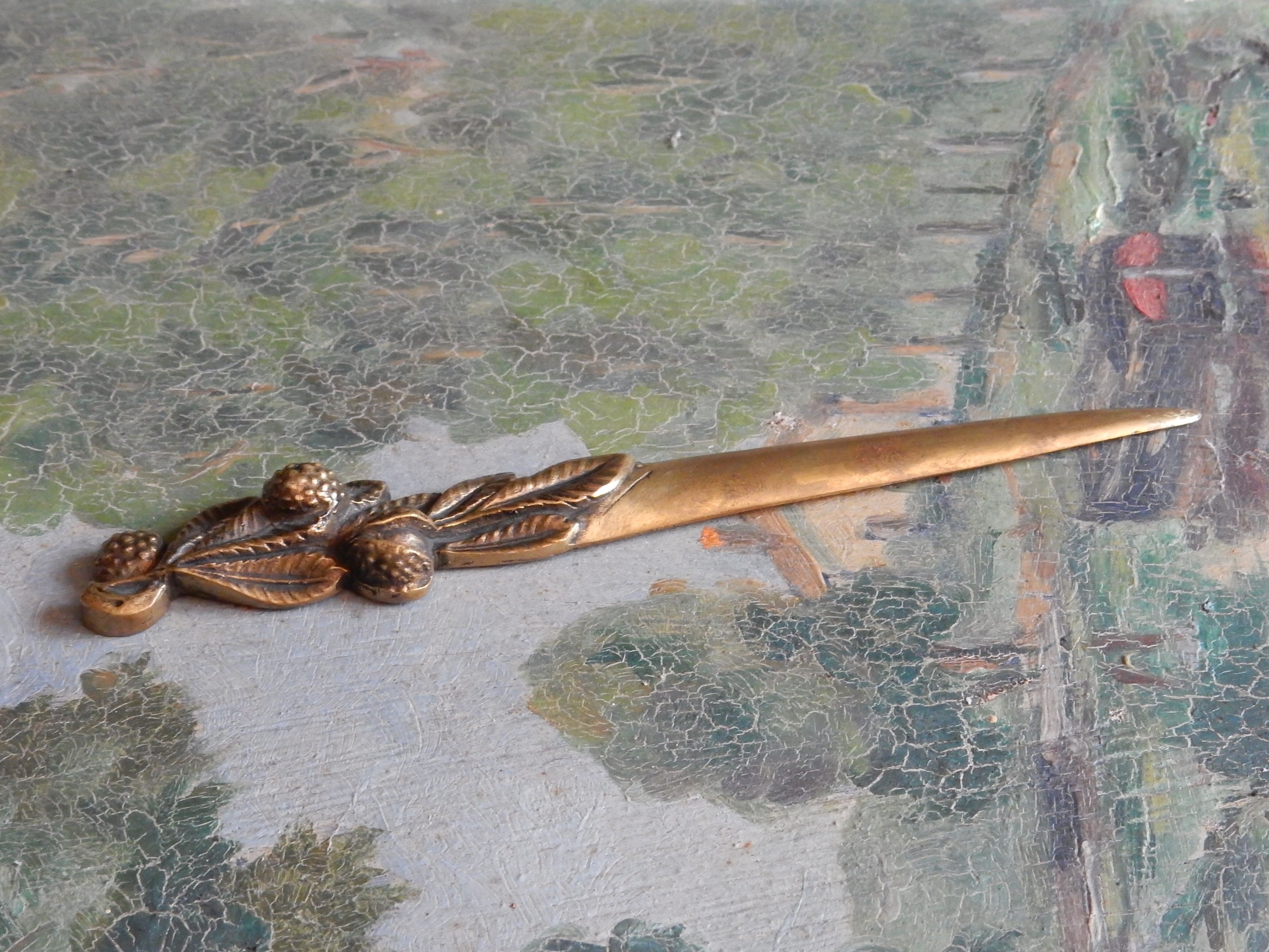 Art Nouveau brass paper cutter